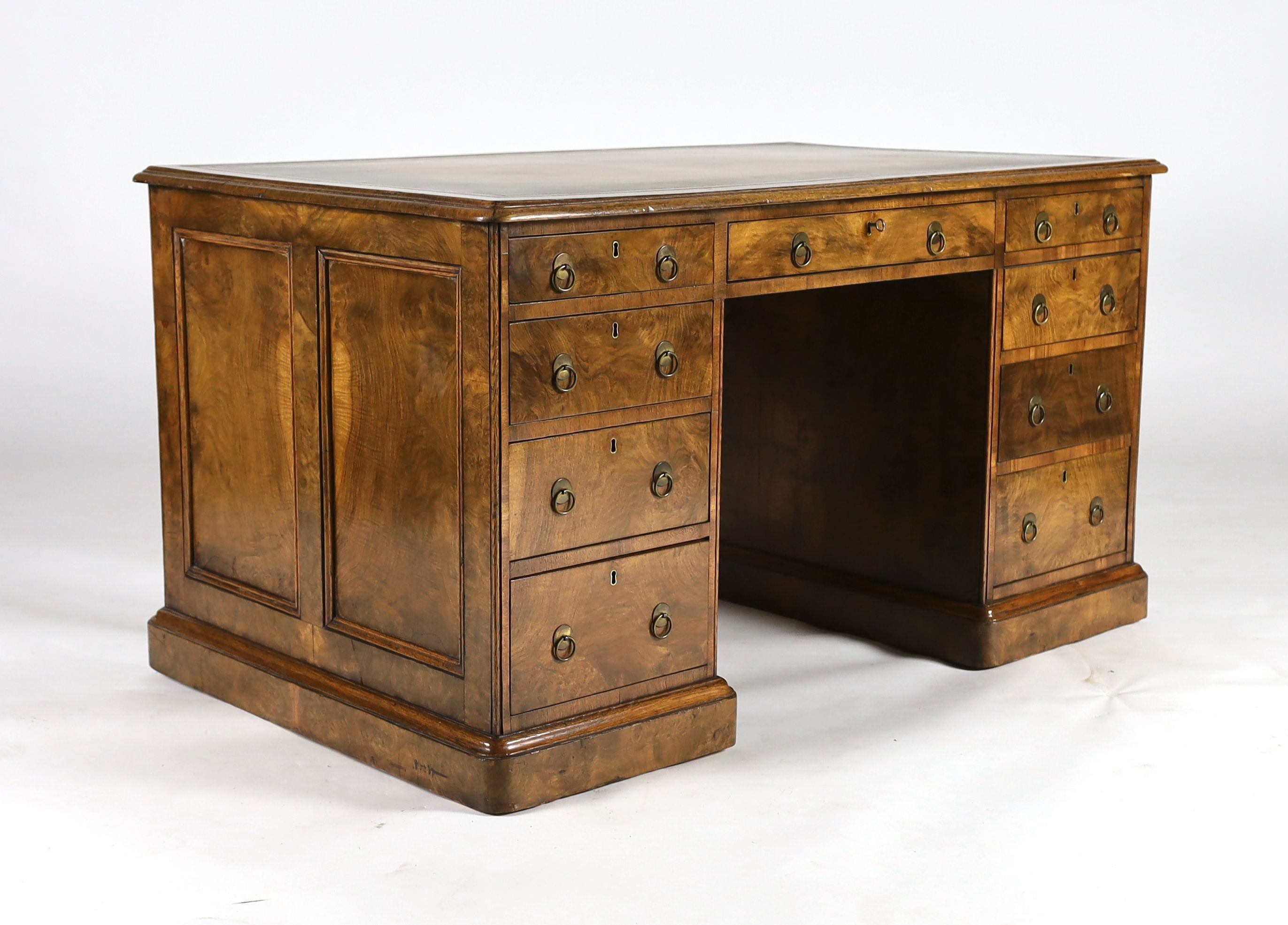 A late Victorian Gillow & Co. walnut pedestal desk, W.137cm D.85cm H.76cm